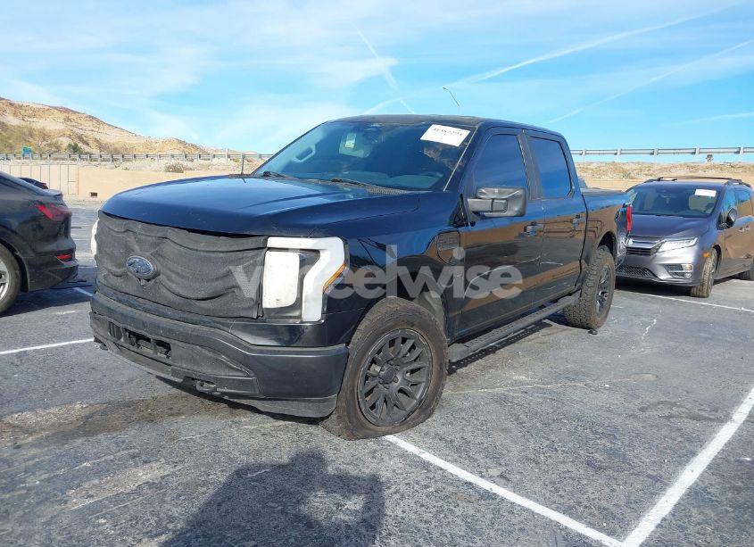 Photo 2 of 2022 Ford F-150 LIGHTNING PRO (VIN 1FTVW1EL8NWG05871)