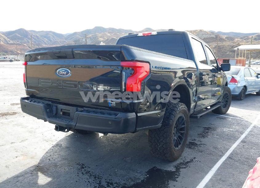 Photo 4 of 2022 Ford F-150 LIGHTNING PRO (VIN 1FTVW1EL8NWG05871)