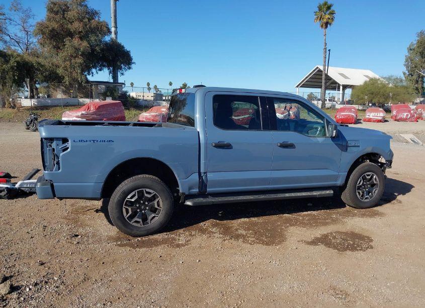 Photo 14 of 2023 Ford F-150 LIGHTNING XLT (VIN 1FTVW1EL9PWG32970)
