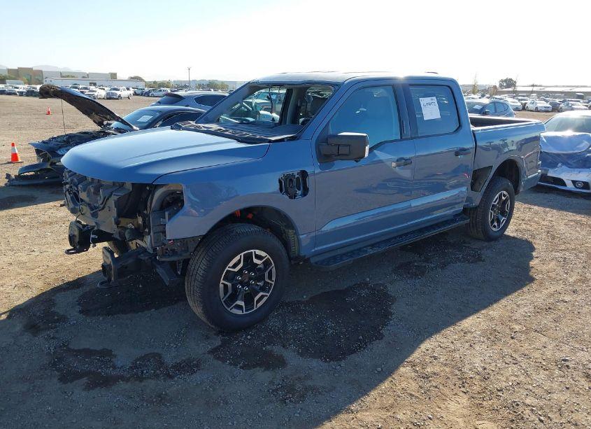 Photo 2 of 2023 Ford F-150 LIGHTNING XLT (VIN 1FTVW1EL9PWG32970)