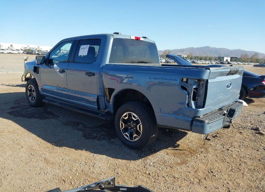 Photo 3 of 2023 Ford F-150 LIGHTNING XLT (VIN 1FTVW1EL9PWG32970)