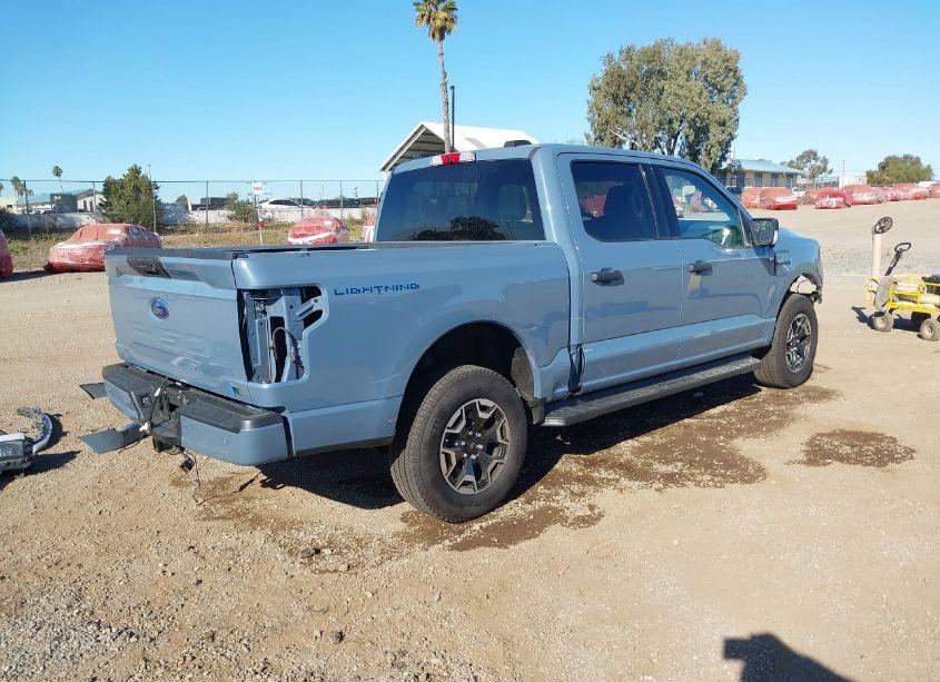 Photo 4 of 2023 Ford F-150 LIGHTNING XLT (VIN 1FTVW1EL9PWG32970)