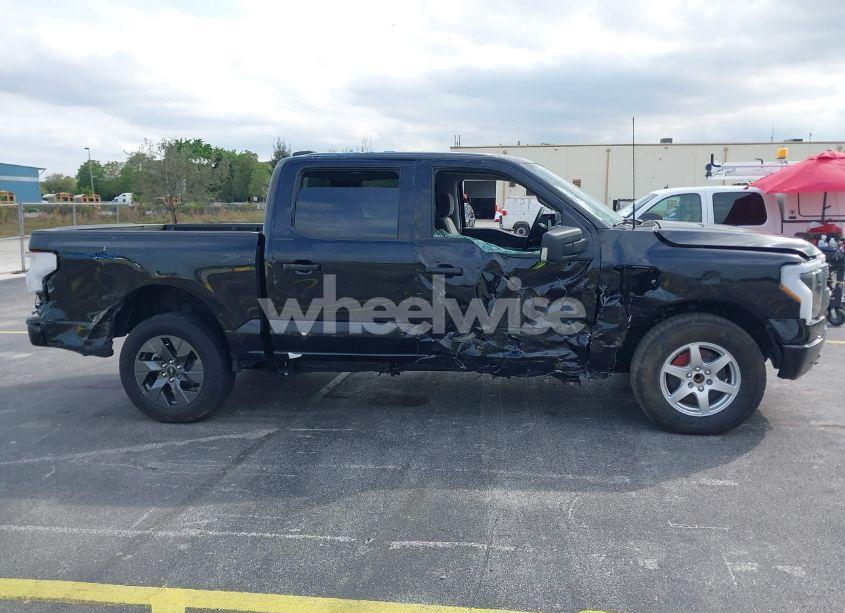 Photo 12 of 2023 Ford F-150 LIGHTNING XLT (VIN 1FTVW1ELXPWG15885)