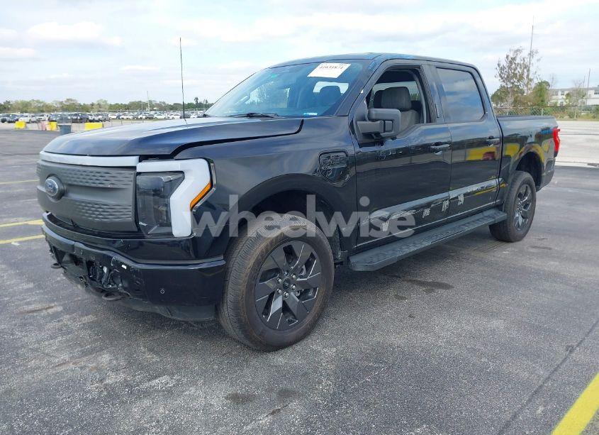 Photo 2 of 2023 Ford F-150 LIGHTNING XLT (VIN 1FTVW1ELXPWG15885)