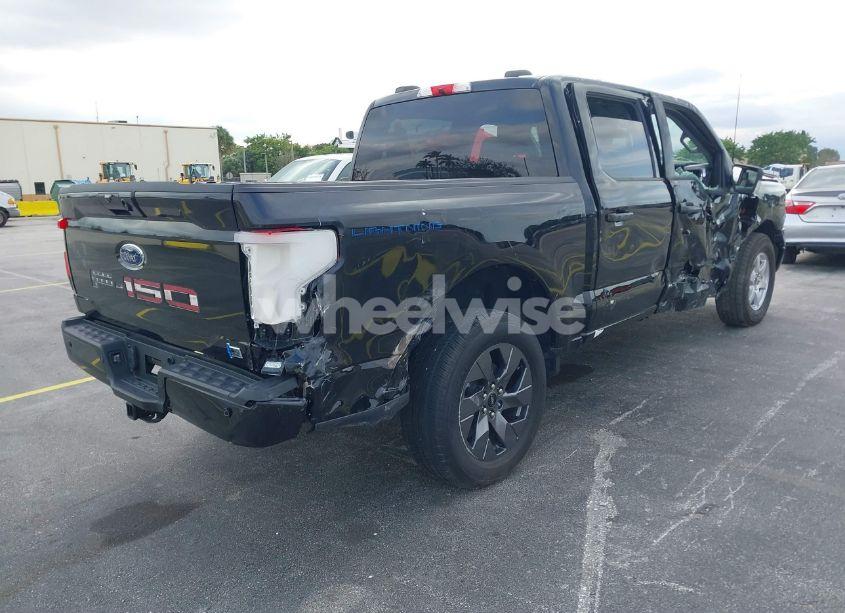 Photo 4 of 2023 Ford F-150 LIGHTNING XLT (VIN 1FTVW1ELXPWG15885)