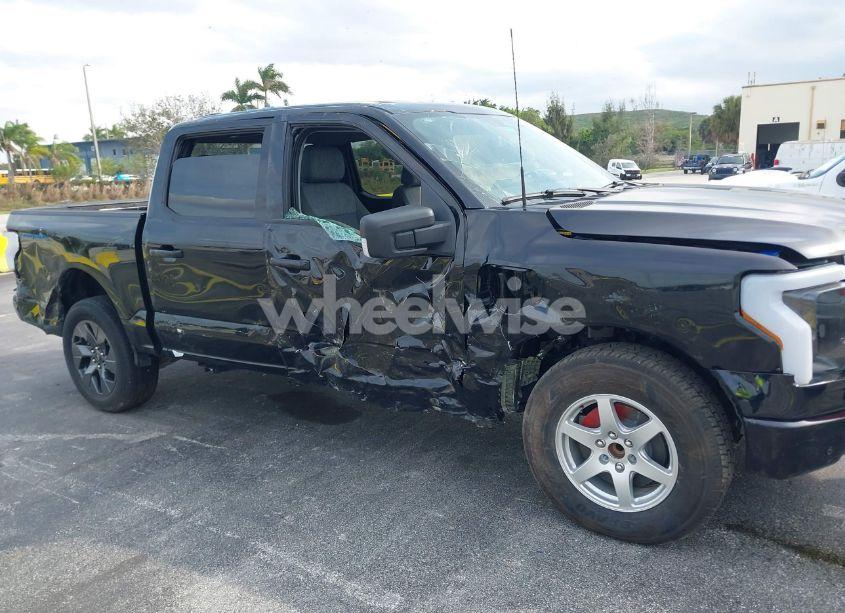 Photo 6 of 2023 Ford F-150 LIGHTNING XLT (VIN 1FTVW1ELXPWG15885)