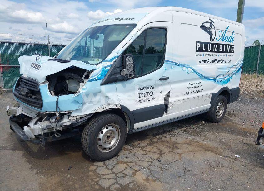 Photo 2 of 2016 Ford Transit-150 (VIN 1FTYE1CM1GKA29370)