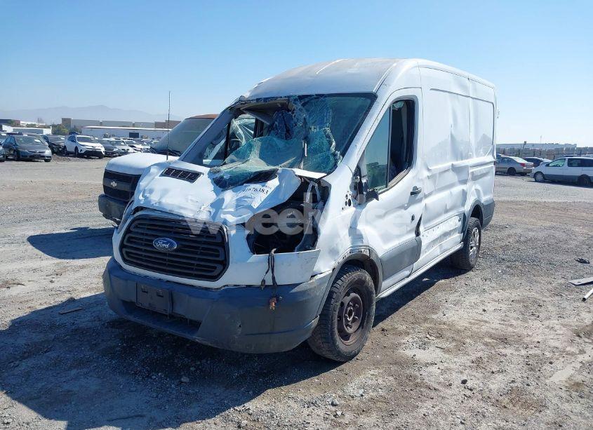 Photo 2 of 2017 Ford Transit-150 (VIN 1FTYE1CM3HKB50922)