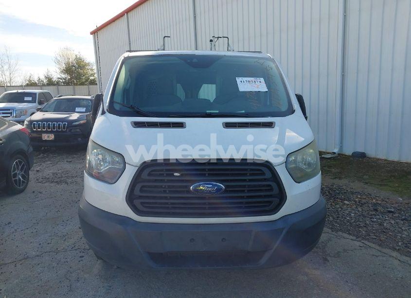 Photo 11 of 2015 Ford Transit-150 (VIN 1FTYE1YM0FKB31248)