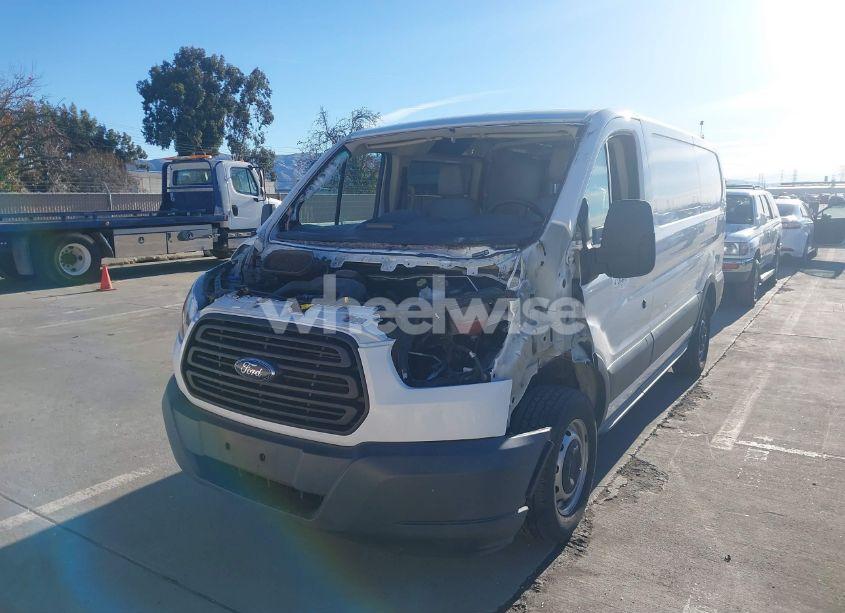 Photo 2 of 2017 Ford Transit-150 (VIN 1FTYE1YM4HKA41703)