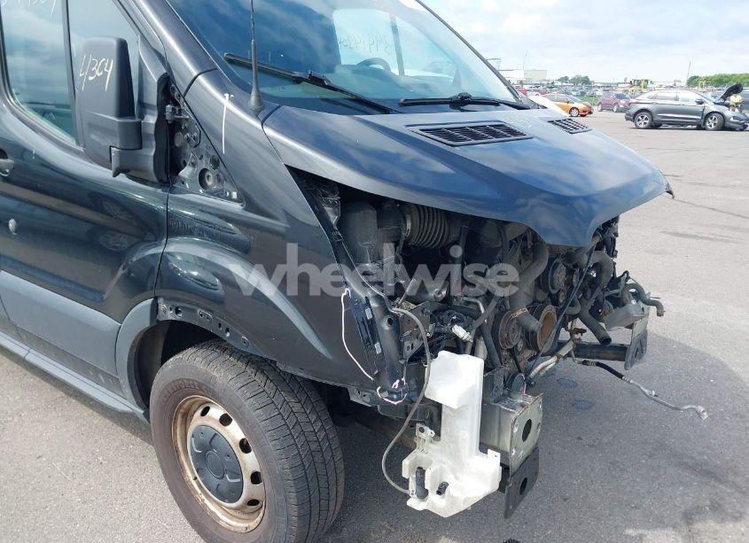 Photo 13 of 2015 Ford Transit-150 (VIN 1FTYE1YM9FKA27910)