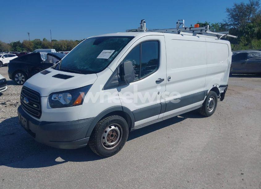 Photo 2 of 2018 Ford Transit-150 (VIN 1FTYE1ZM0JKA39340)