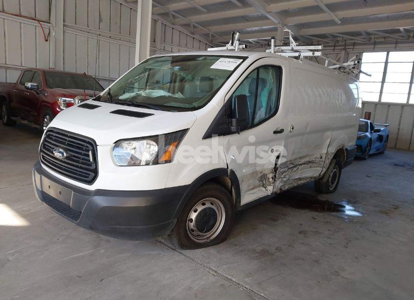 Photo 2 of 2019 Ford Transit-150 (VIN 1FTYE1ZM1KKA55404)