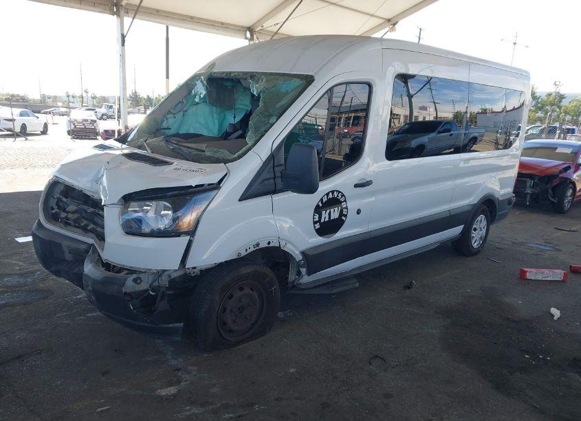 Photo 2 of 2019 Ford Transit-150 (VIN 1FTYE2CM4KKA21102)
