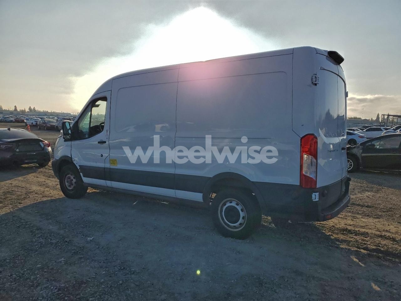 Photo 2 of 2019 FORD TRANSIT T-150 (VIN 1FTYE2CM7KKB69437)