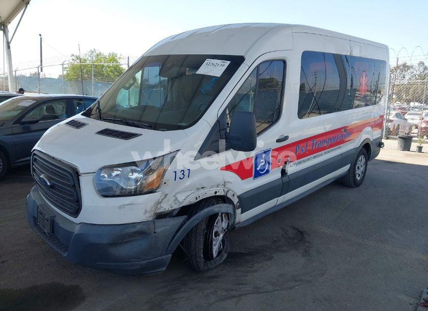 Photo 2 of 2018 Ford Transit-150 (VIN 1FTYE2CMXJKA26321)