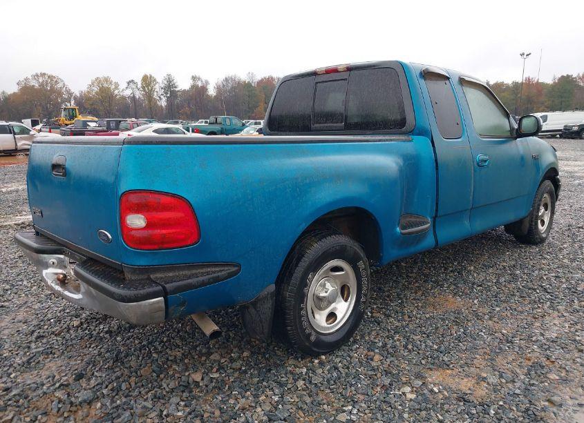 Photo 4 of 1999 Ford F-150 XL/XLT (VIN 1FTZX0727XKA51035)