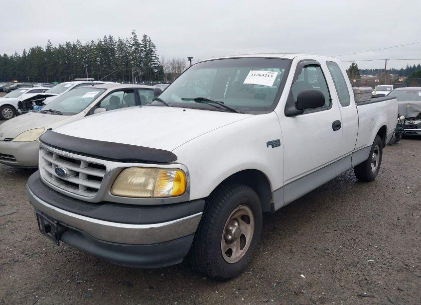 Photo 2 of 1999 Ford F-150 WORK SERIES/XL/XLT (VIN 1FTZX1721XNA60950)