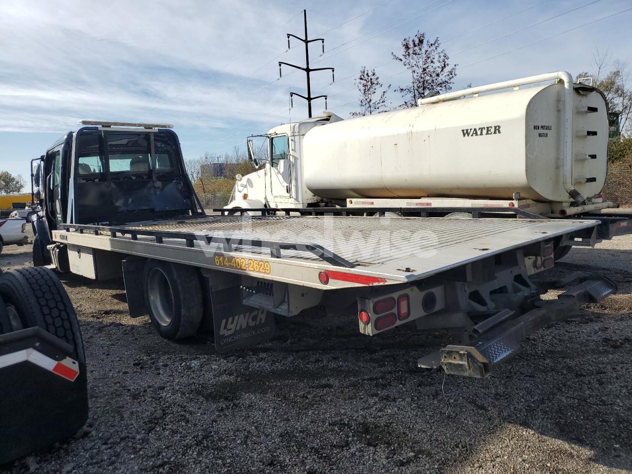 Photo 2 of 2023 FREIGHTLINER BUSINESS CLASS M2 ROLLBACK TRUCK (VIN 1FVACWFC8PHNX2885)