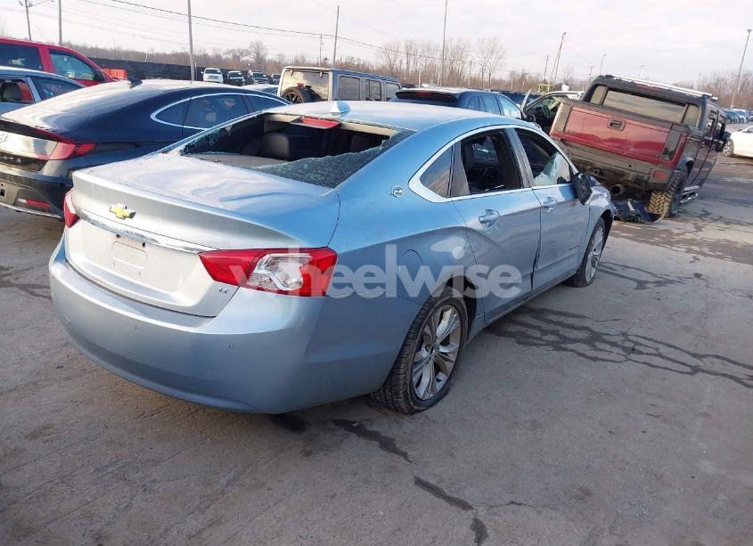 Photo 4 of 2014 Chevrolet Impala 1LT (VIN 1G1115SL3EU132636)