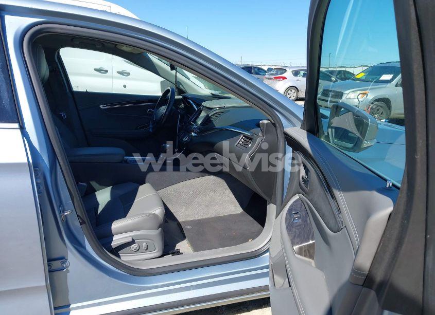 Photo 5 of 2014 Chevrolet Impala 1LT (VIN 1G1115SLXEU171210)