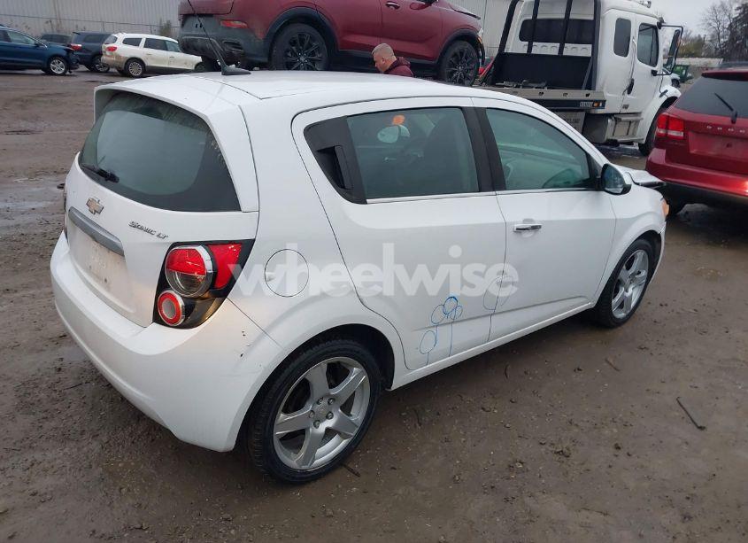 Photo 4 of 2014 Chevrolet Sonic (VIN 1G1JC6EH9E4204107)