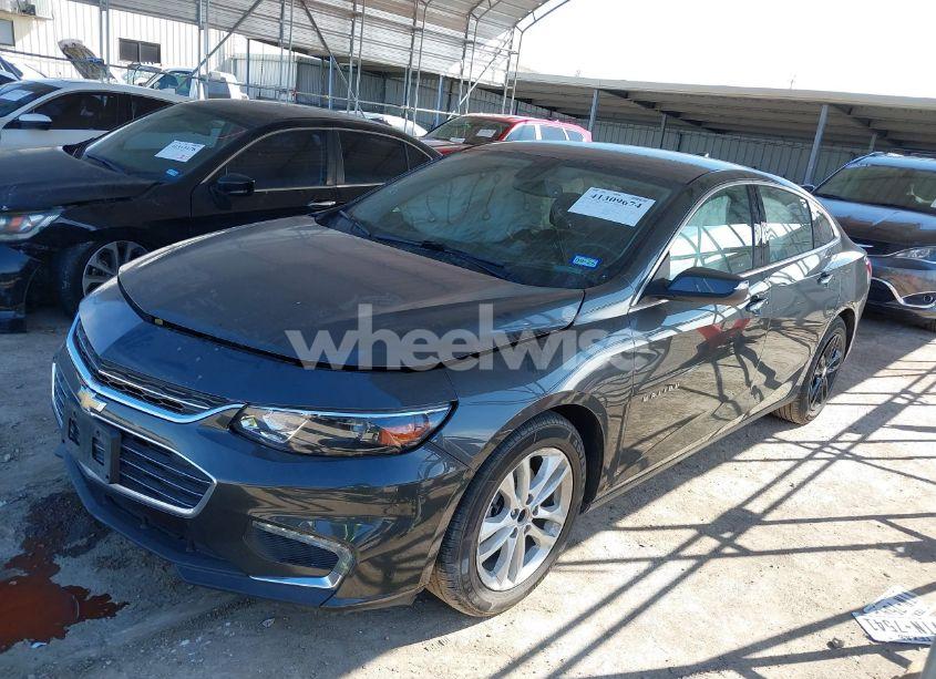 Photo 2 of 2017 Chevrolet Malibu (VIN 1G1ZE5ST0HF197735)