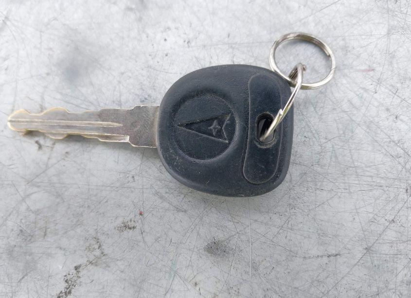 Photo 11 of 1999 Pontiac Grand AM SE (VIN 1G2NE52T7XM944624)