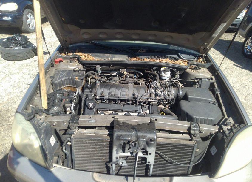 Photo 10 of 2004 Cadillac Deville STANDARD (VIN 1G6KD54Y54U207138)