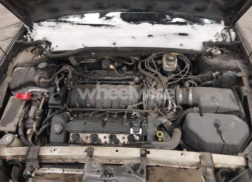 Photo 10 of 2005 Cadillac Deville DTS (VIN 1G6KF57955U103250)