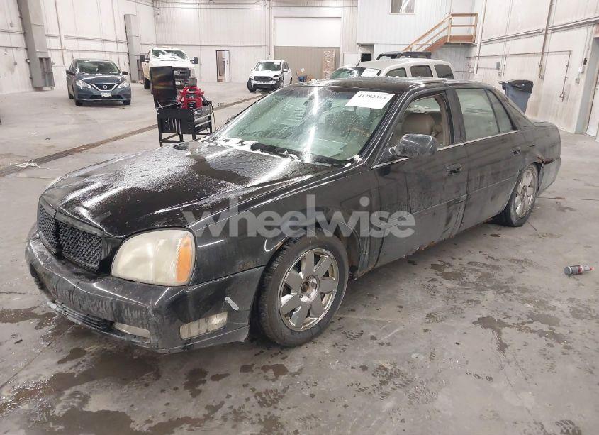 Photo 2 of 2005 Cadillac Deville DTS (VIN 1G6KF57955U103250)