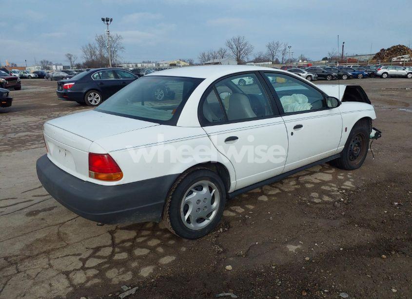 Photo 4 of 1999 Saturn Sl1 N/A (VIN 1G8ZG5283XZ329617)