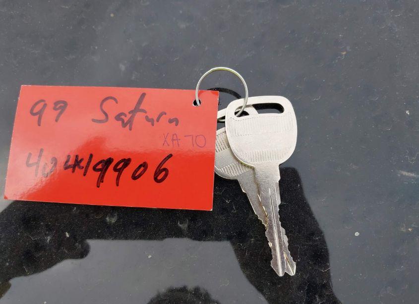 Photo 11 of 1999 Saturn Sl1 N/A (VIN 1G8ZG5284XZ340318)