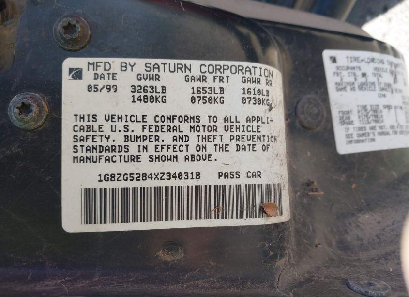 Photo 9 of 1999 Saturn Sl1 N/A (VIN 1G8ZG5284XZ340318)