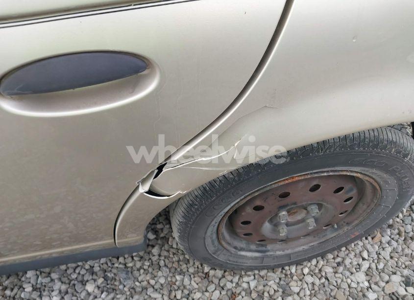 Photo 12 of 1999 Saturn Sl1 N/A (VIN 1G8ZH5282XZ273375)