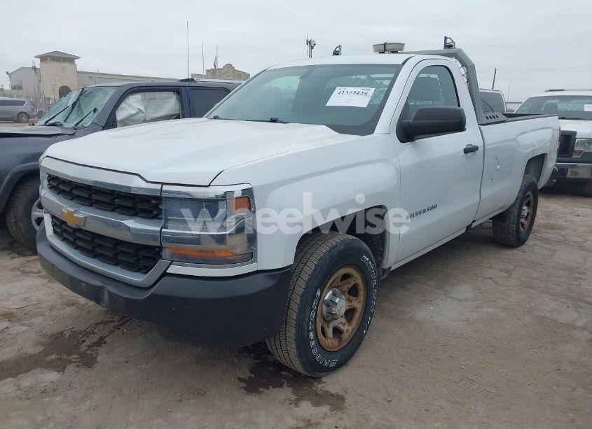 Photo 2 of 2017 Chevrolet Silverado 1500 WT (VIN 1GCNCNEC2HZ214394)
