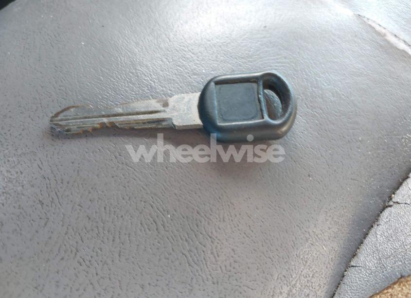 Photo 11 of 1999 Chevrolet Tahoe LS (VIN 1GNEC13R3XJ567487)