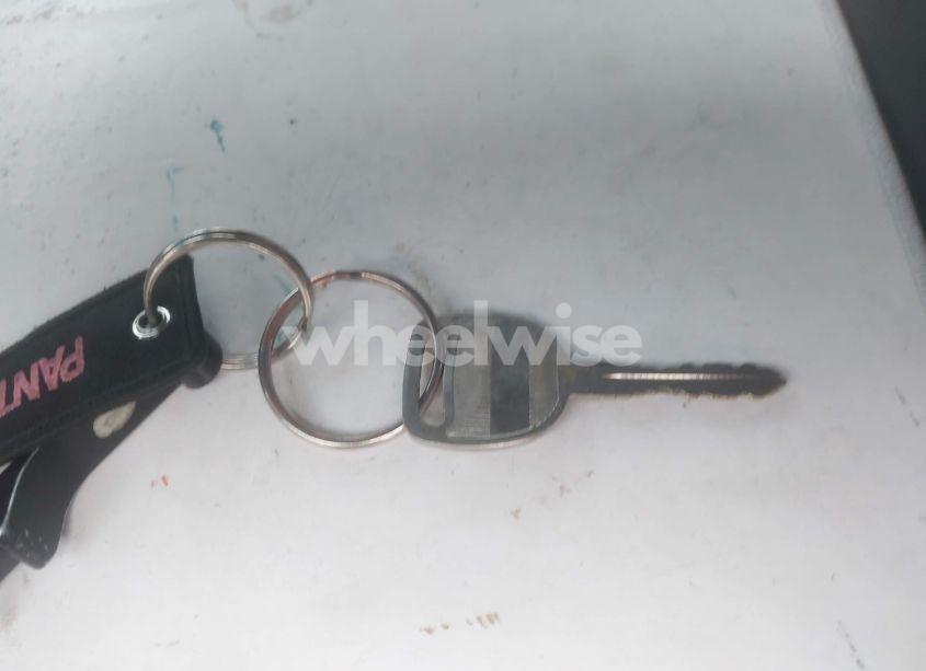 Photo 11 of 2004 Chevrolet Tahoe LT (VIN 1GNEK13T64R142485)