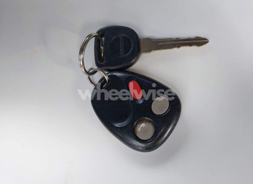 Photo 11 of 2004 Chevrolet Tahoe LT (VIN 1GNEK13T84J238990)