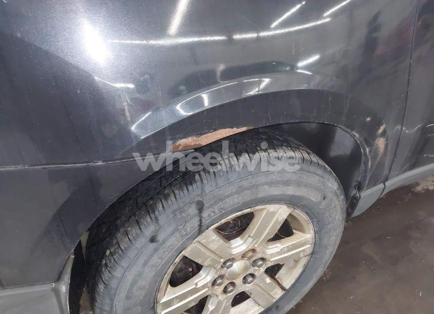 Photo 13 of 2011 Chevrolet Traverse 2LT (VIN 1GNKVJEDXBJ159365)