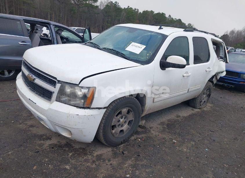 Photo 2 of 2011 Chevrolet Tahoe LS (VIN 1GNSCAE05BR164865)
