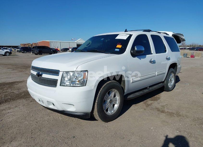 Photo 2 of 2011 Chevrolet Tahoe LS (VIN 1GNSCAE05BR256493)