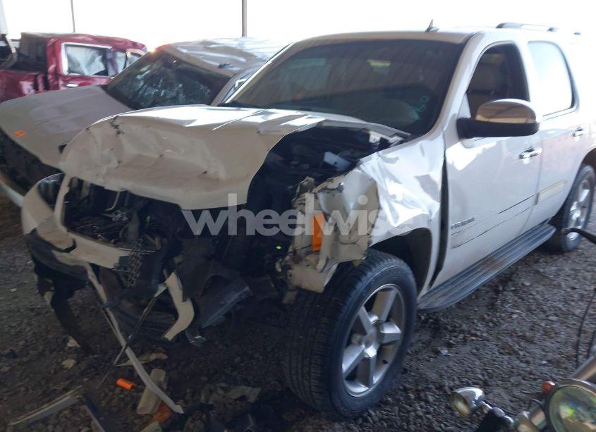 Photo 2 of 2011 Chevrolet Tahoe LS (VIN 1GNSCAE06BR268913)