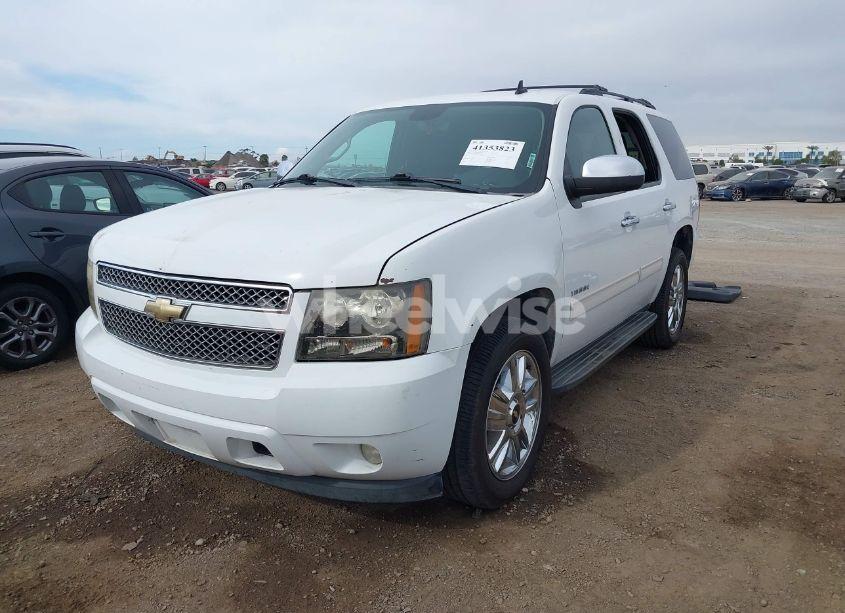Photo 2 of 2011 Chevrolet Tahoe LS (VIN 1GNSCAE08BR380886)