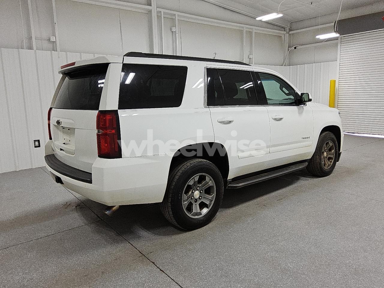 Photo 3 of 2019 CHEVROLET TAHOE C1500 LS (VIN 1GNSCAKC7KR212591)