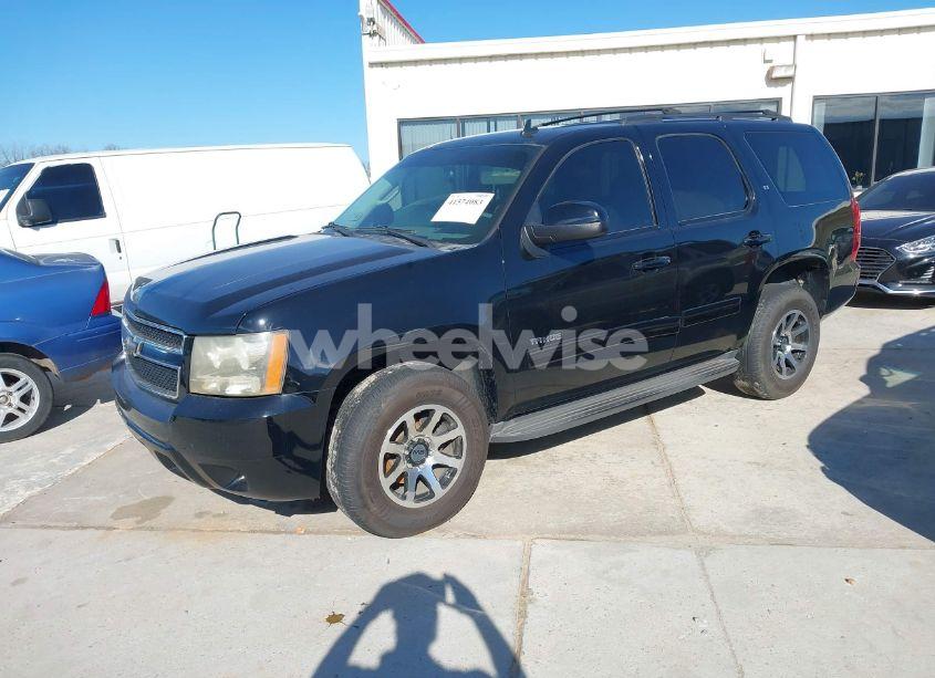 Photo 2 of 2011 Chevrolet Tahoe LT (VIN 1GNSCBE01BR190241)