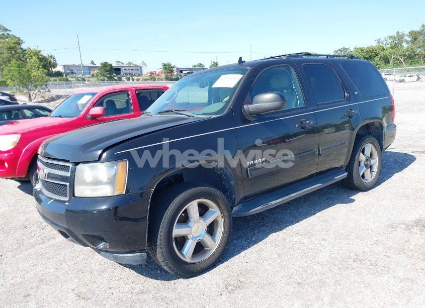 Photo 2 of 2011 Chevrolet Tahoe LT (VIN 1GNSCBE09BR379607)