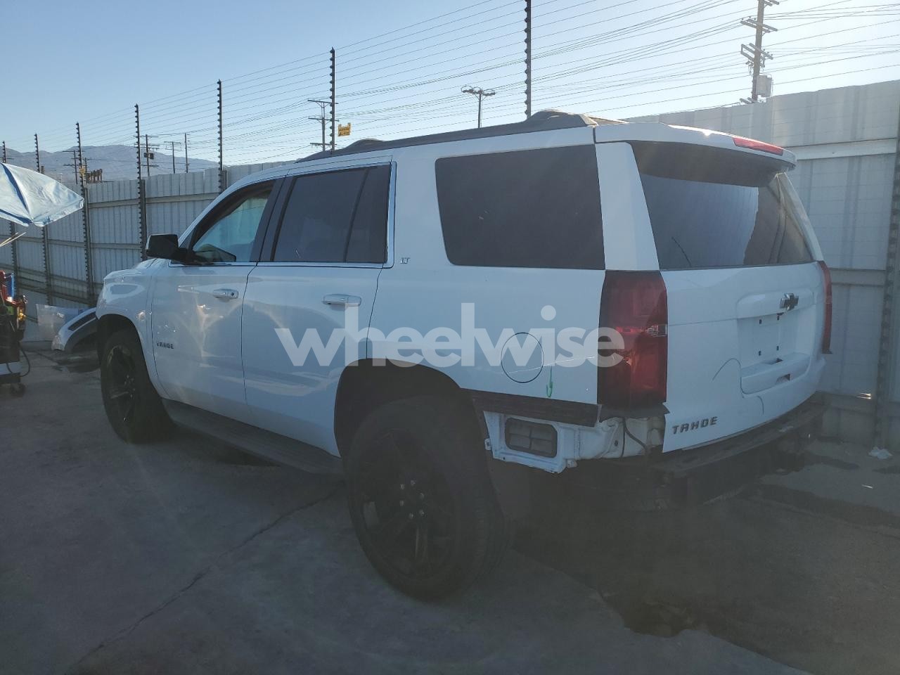 Photo 2 of 2017 CHEVROLET TAHOE C1500 LT (VIN 1GNSCBKC2HR339330)