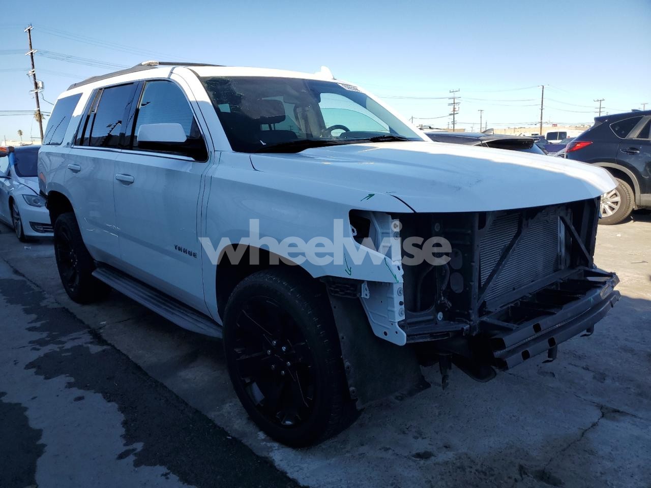 Photo 4 of 2017 CHEVROLET TAHOE C1500 LT (VIN 1GNSCBKC2HR339330)