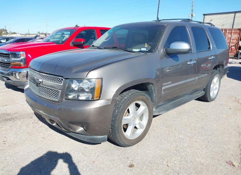 Photo 2 of 2011 Chevrolet Tahoe LTZ (VIN 1GNSCCE02BR125372)